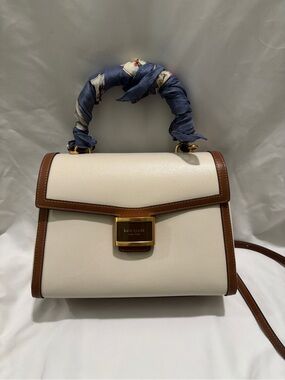 kate spade Cream Satchel with Brown Trim and Blue-Accent Handle Wrap
